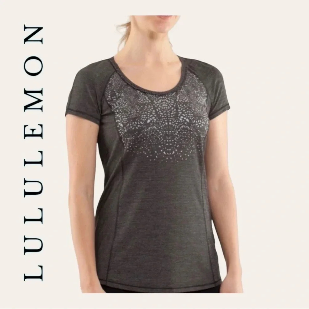 0423W. LULULEMON‎ RUN WILD SHORT SLEEVE TOP GRAY IN COLOR SIZE 4